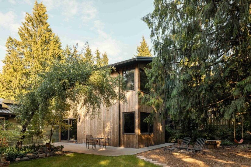 Custom ADU exterior with private patio and seating area