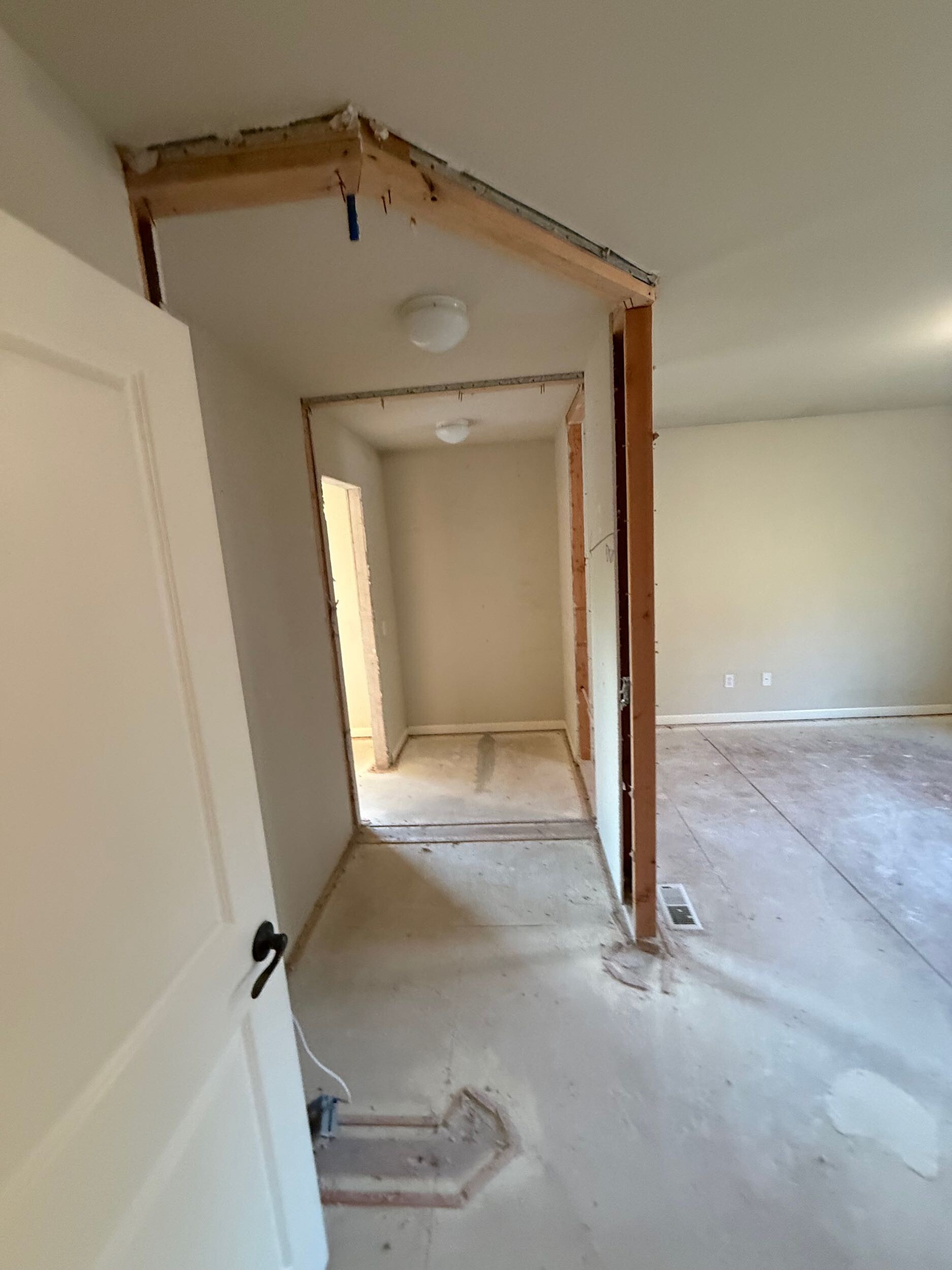 Debris removal during master bathroom demolition Bothell remodel