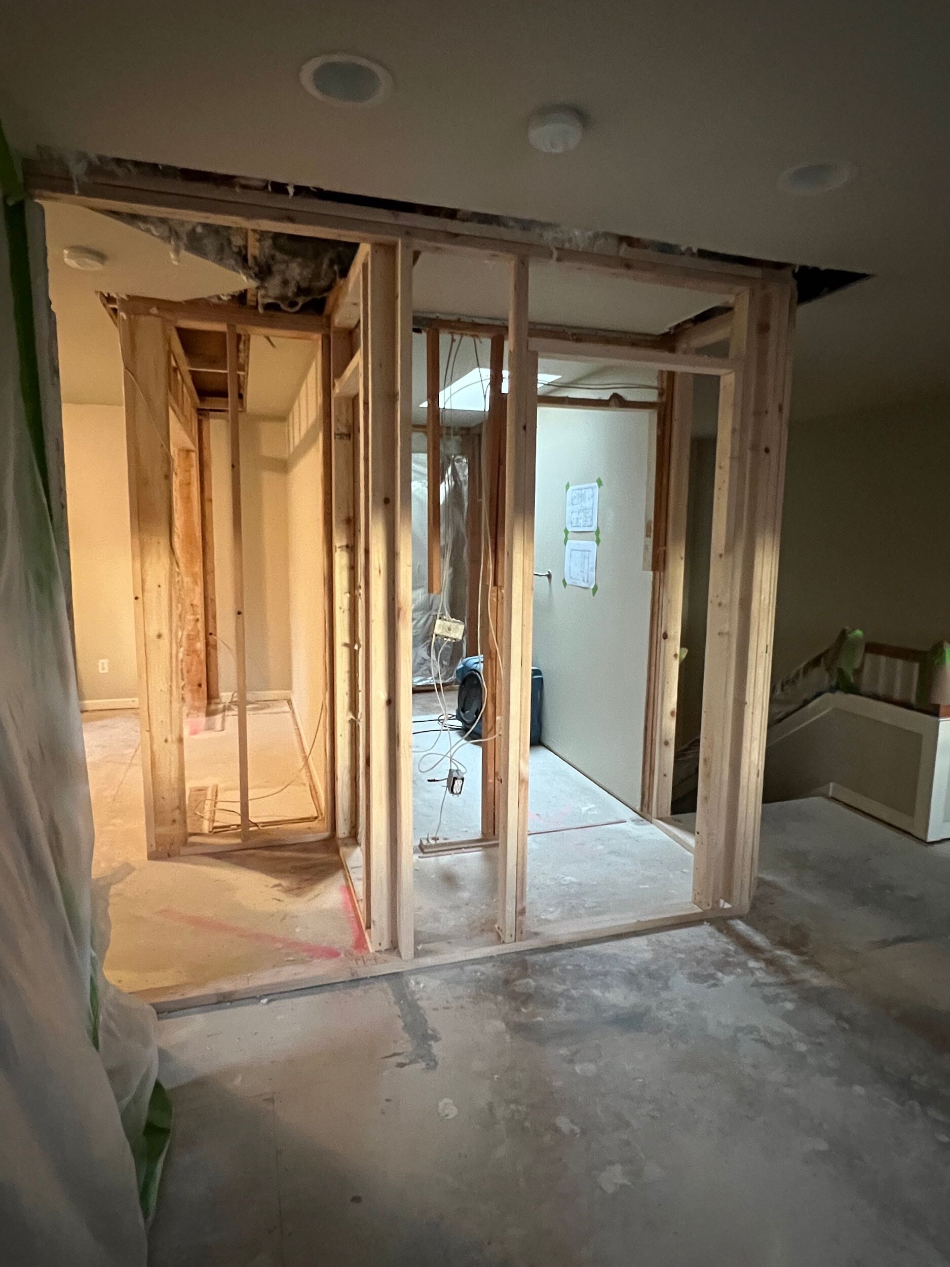 Framing layout walk chalk lines on subfloor Bothell master suite remodel