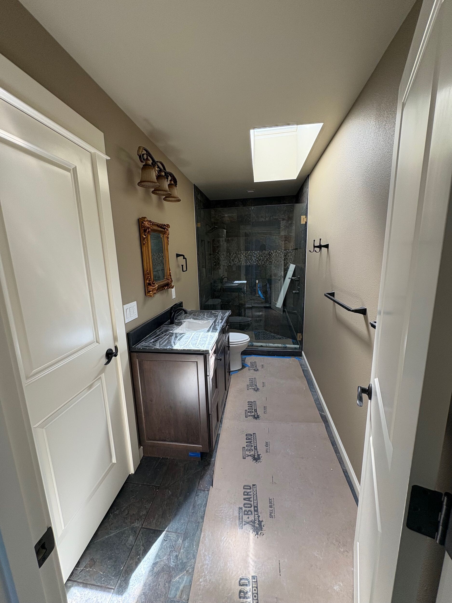 Custom frameless shower glass installation Bothell master bathroom